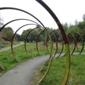 Giant Steel Hoops artwork on Spen Valley Greenway faily friendlu cycle route