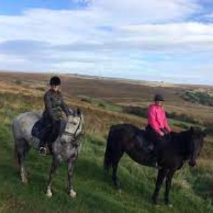 Two riders on the North Yorkshire Moors with Bilsdale Riding Centre