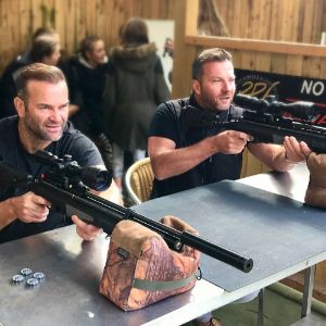 two adult males ready to shoot in the Bawtry rifle range