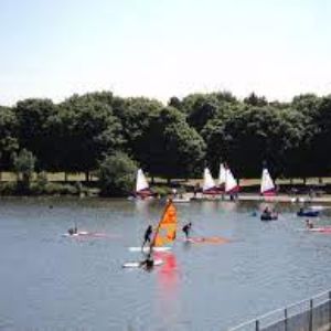 Sail boats, kayaks and canoes on the waterat Leeds sailing and activity centre