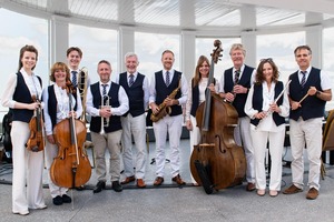 Scarborough Spa Orchestra members with their instruments