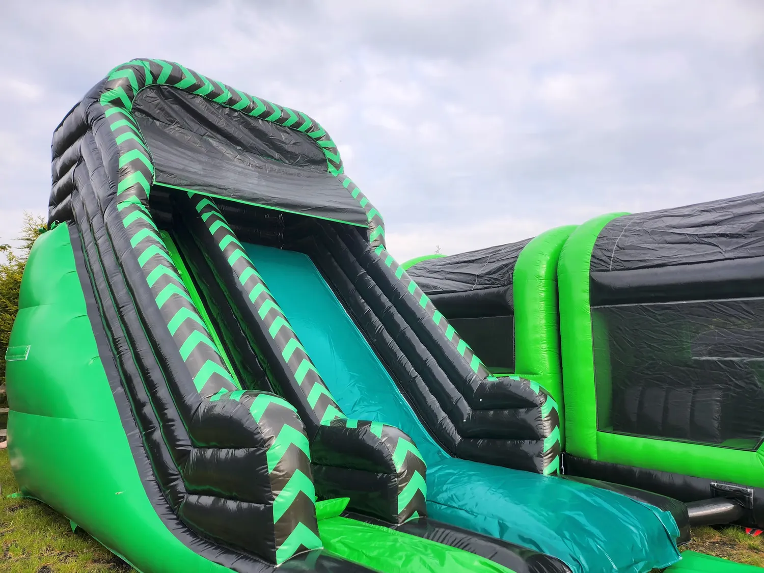 black and green inflatble bouncy slide
