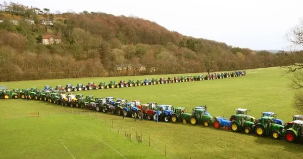 Line of tractors heading out on the tractor run