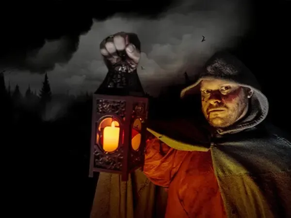 Viking holding up a lantern against a brooding sky